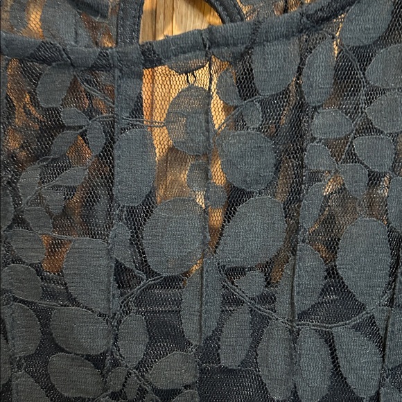 Black lace dress over solid black tank 100% polyester shell. - Picture 2 of 4